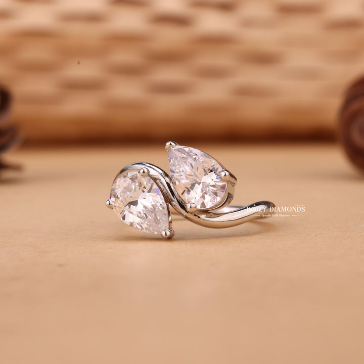 Detailed close-up of pear solitaire diamond engagement ring