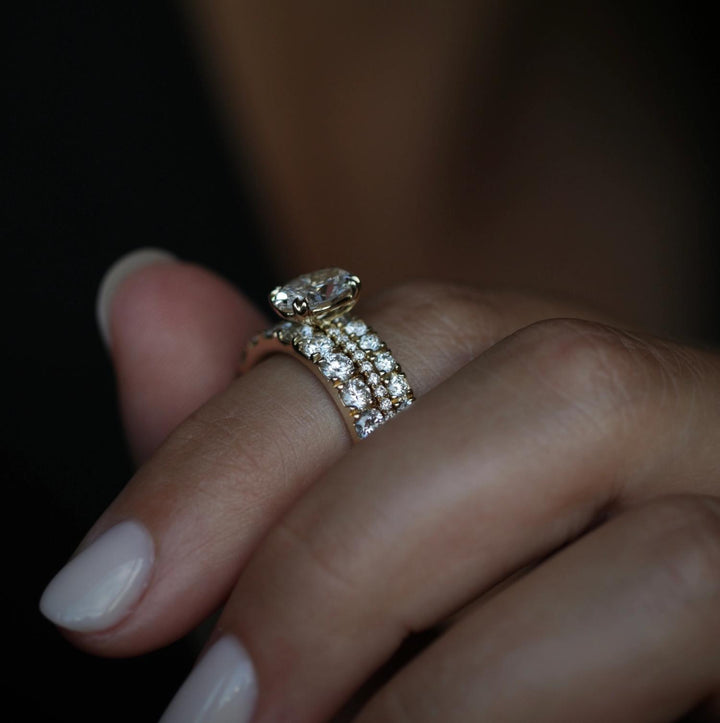 Oval cut diamond ring worn on hand