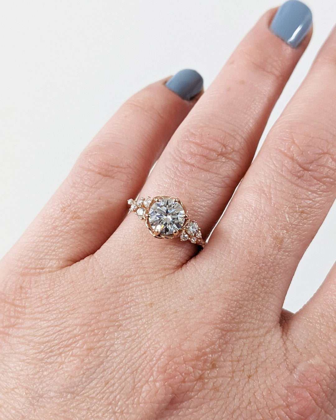 Macro shot of round cut diamond facets in cluster ring setting