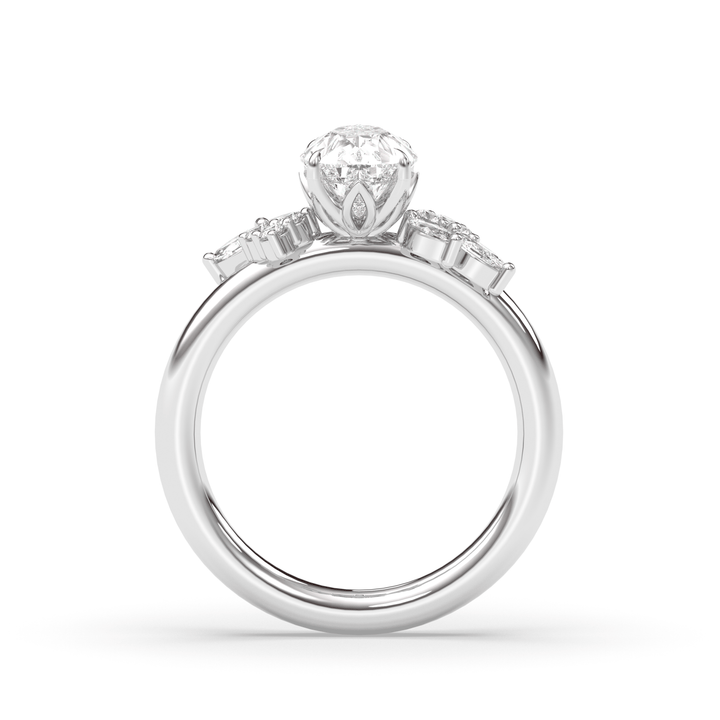 Pear cluster engagement ring photographed in natural light