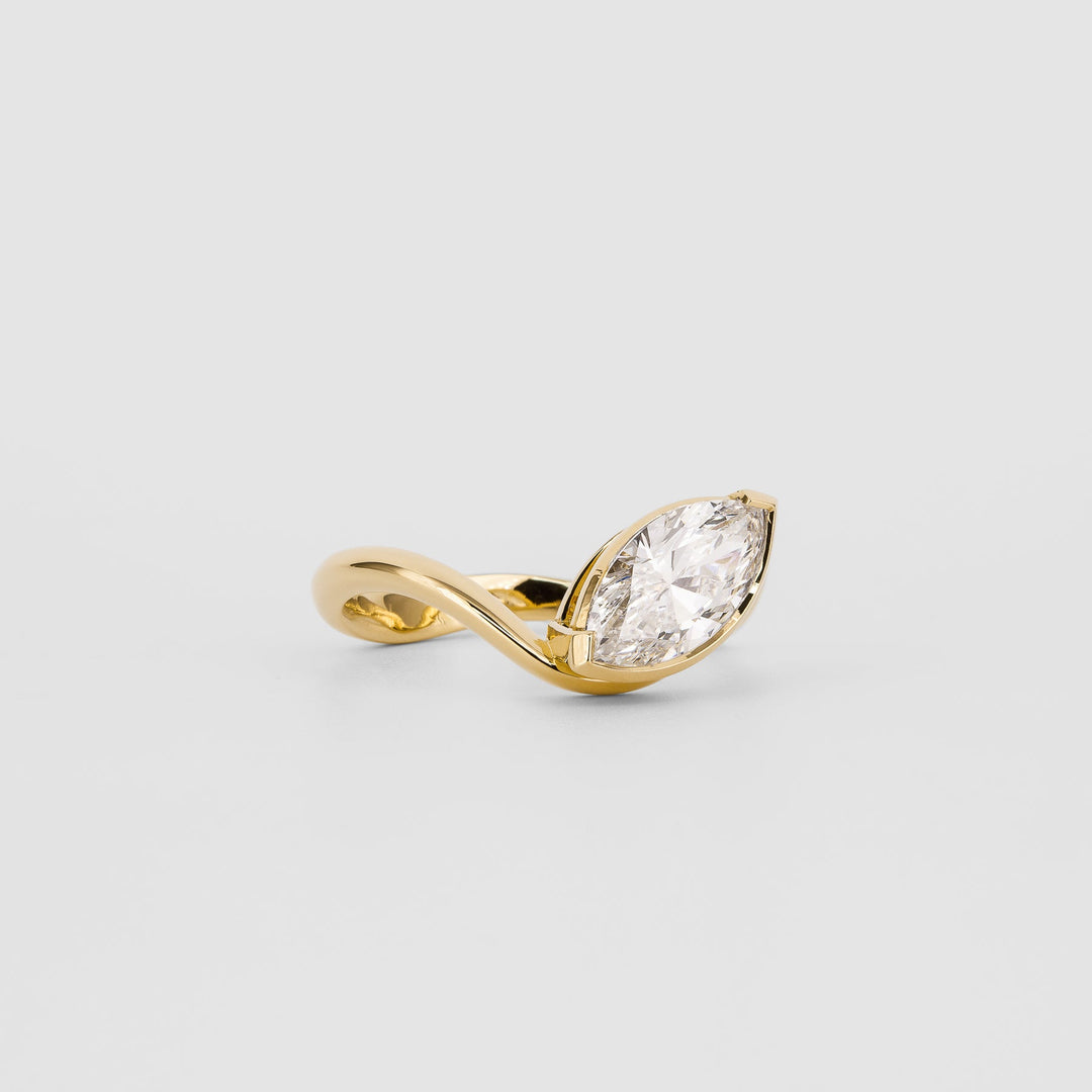 Premium marquise cut solitaire engagement ring crafted in solid gold