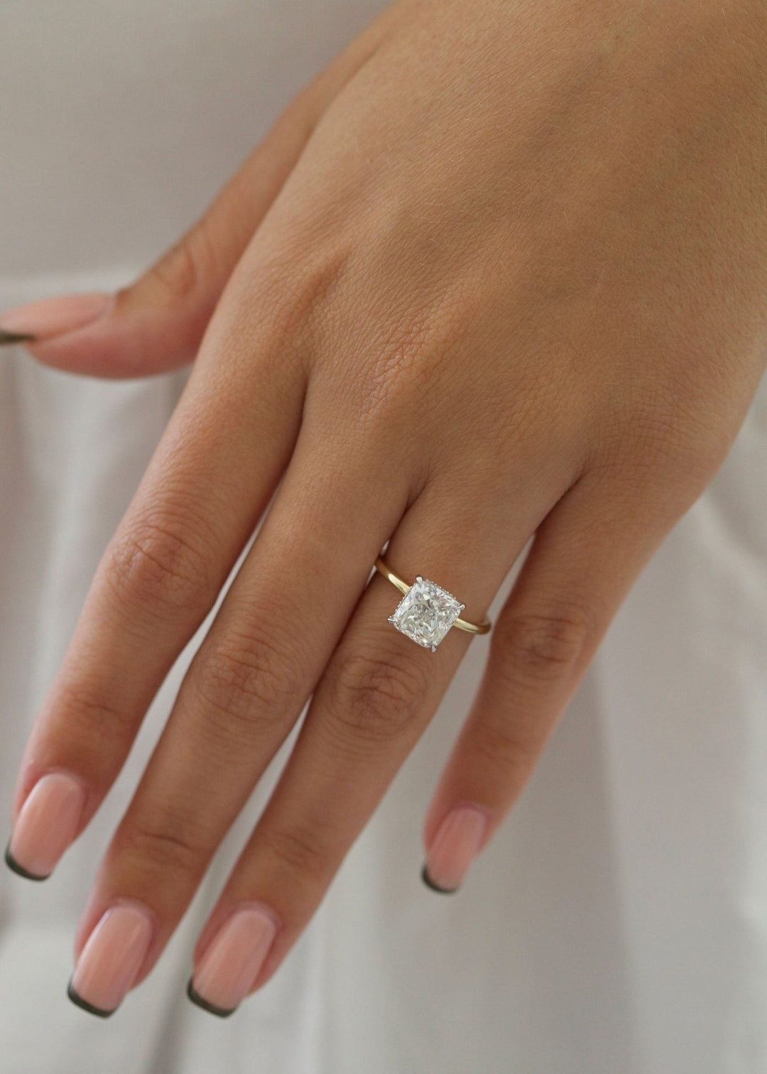 Cushion hidden halo engagement ring with certified lab grown diamond