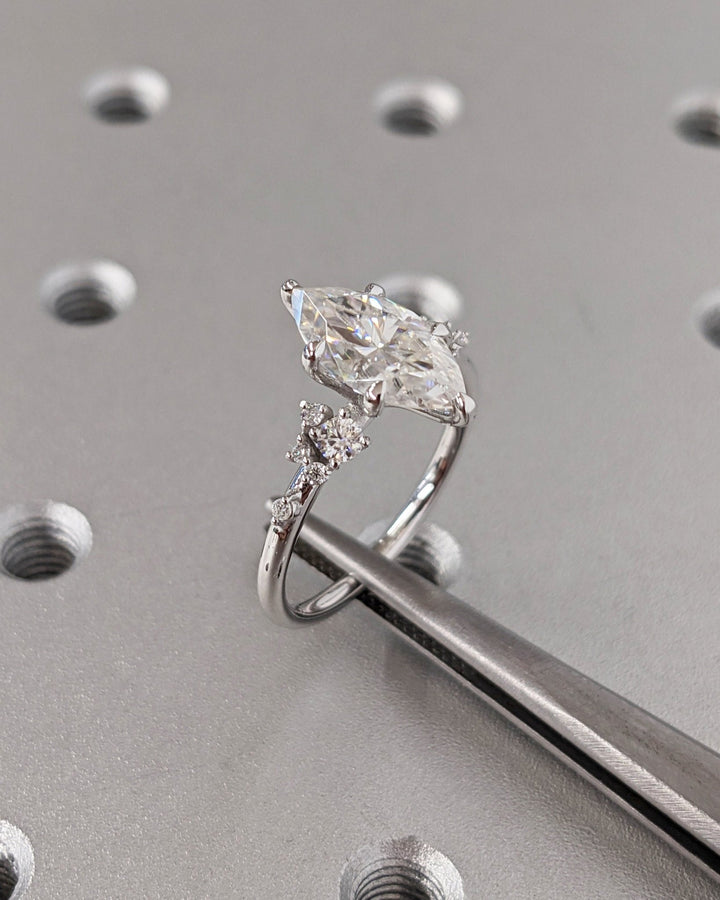 Marquise cluster engagement ring with certified lab grown diamond