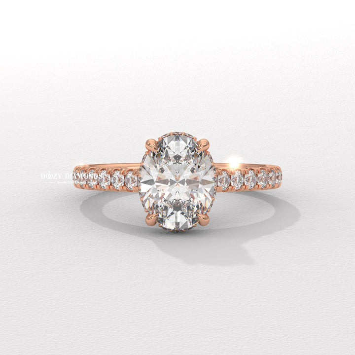 Side angle of oval halo diamond engagement ring