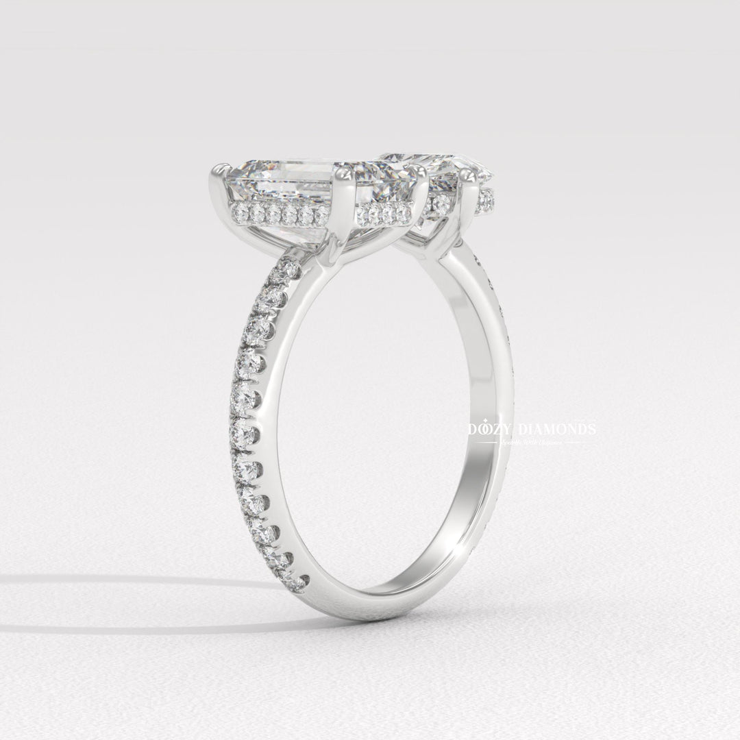 Lifestyle shot of pear solitaire diamond ring on hand