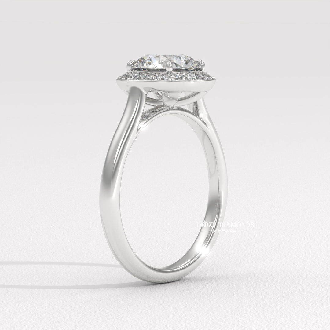 Round halo engagement ring close-up showing high clarity diamond clarity