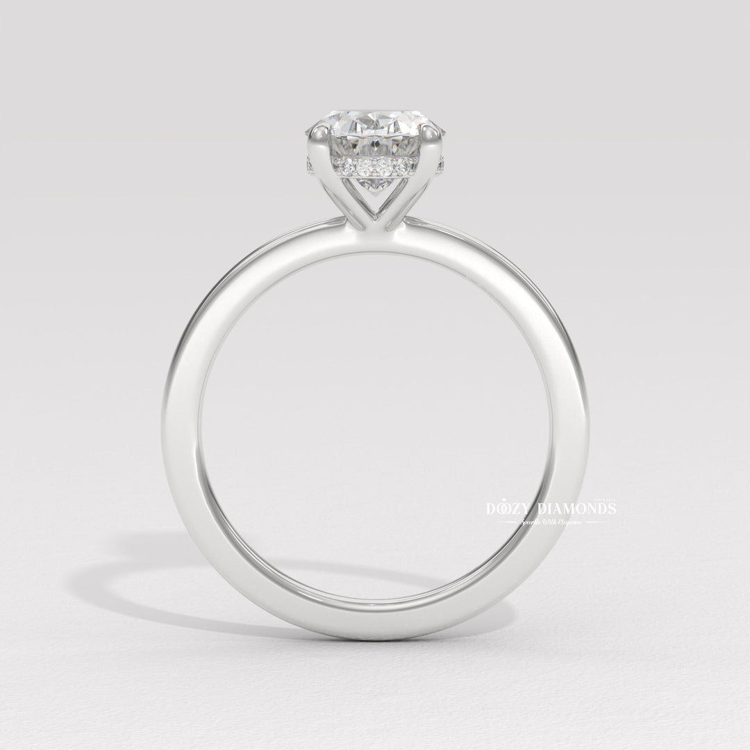 Profile view of oval cut solitaire engagement ring band