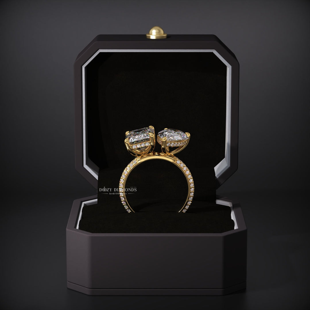 Certified pear cut diamond featured in hidden halo engagement ring