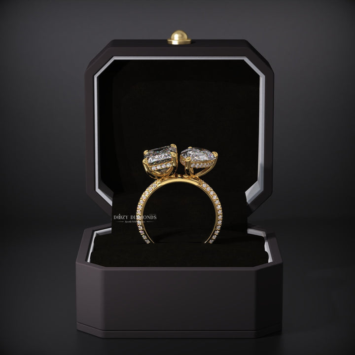 Certified pear cut diamond featured in hidden halo engagement ring