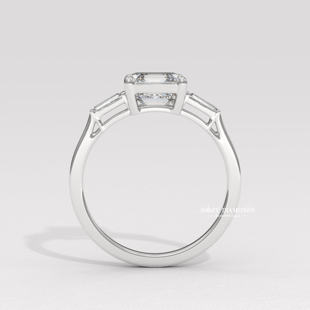 Profile view of asscher cut three stone engagement ring band