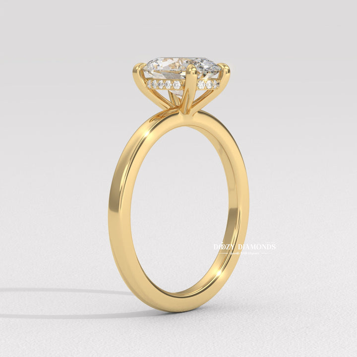 Macro shot of oval cut diamond facets in solitaire ring setting