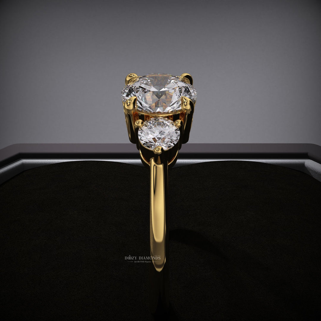 Profile view of round cut three stone engagement ring band