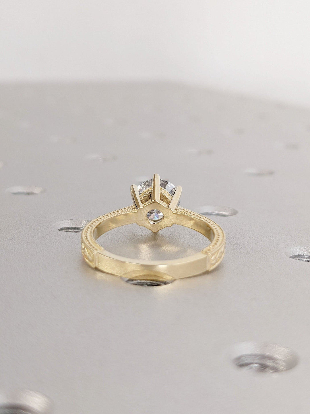 Round vintage lab grown diamond ring side profile in gold setting