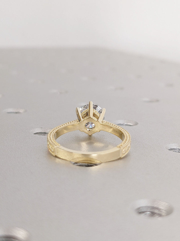 Round vintage lab grown diamond ring side profile in gold setting