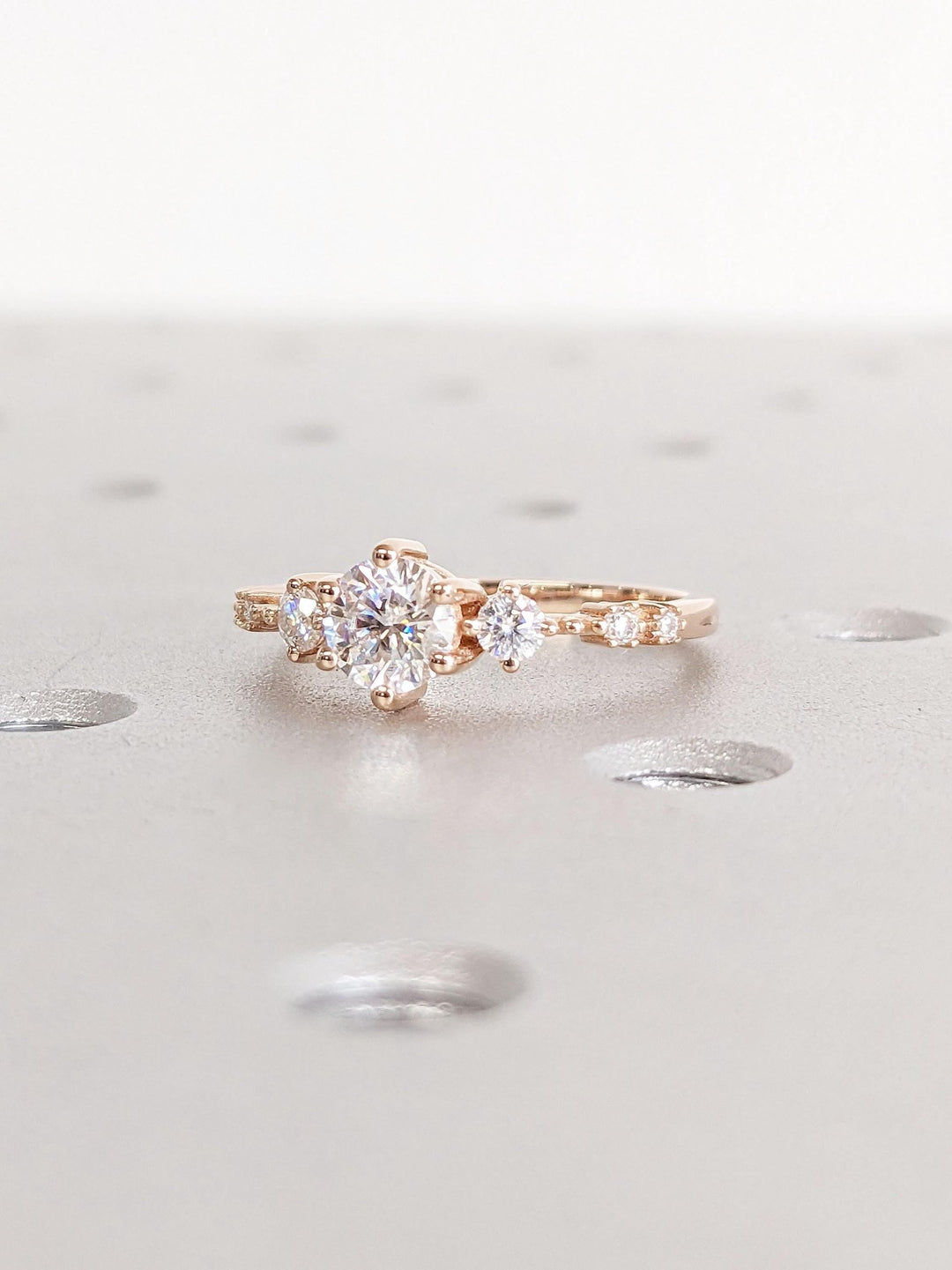 Premium round cut cluster engagement ring crafted in solid gold