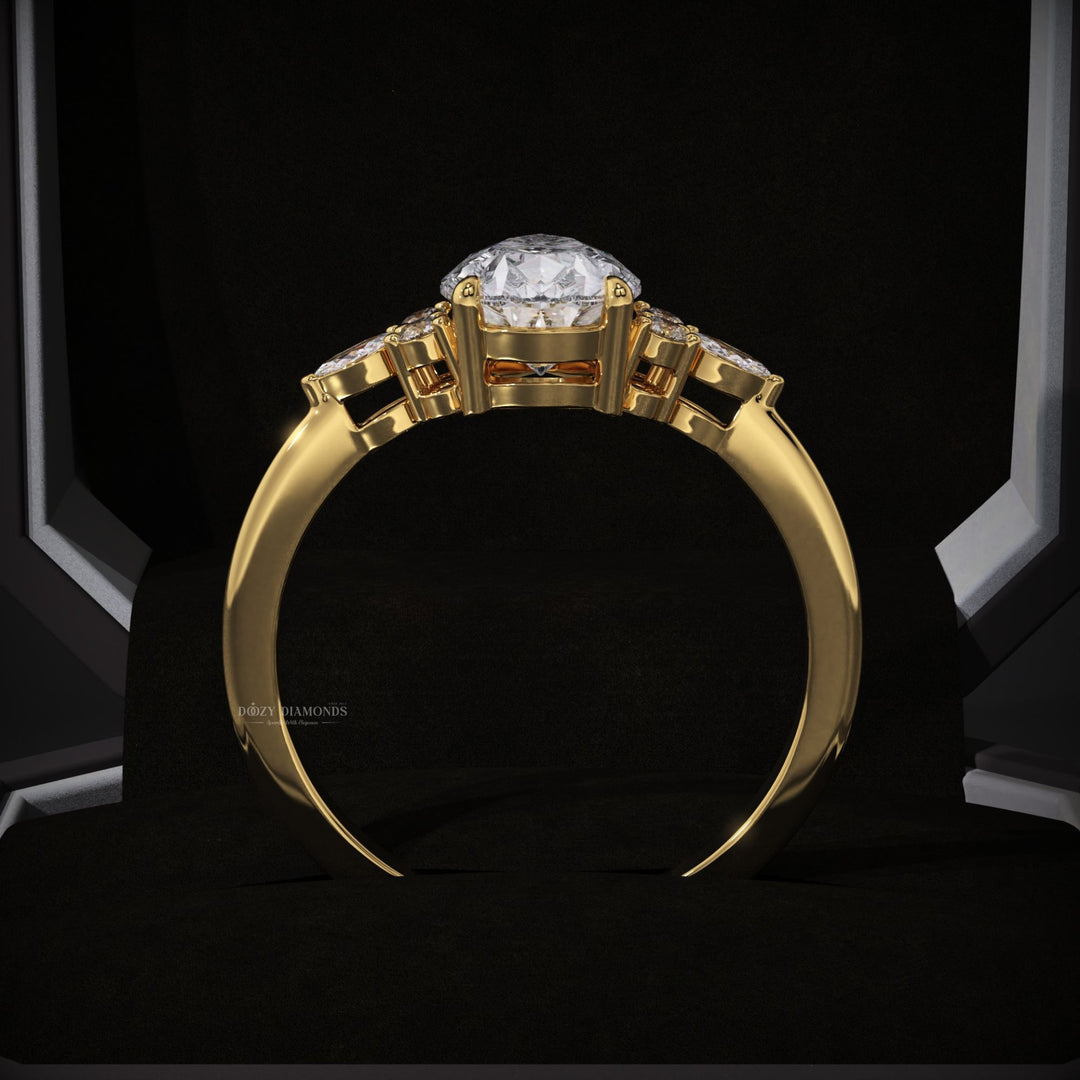 Pear cluster diamond engagement ring available in multiple metals