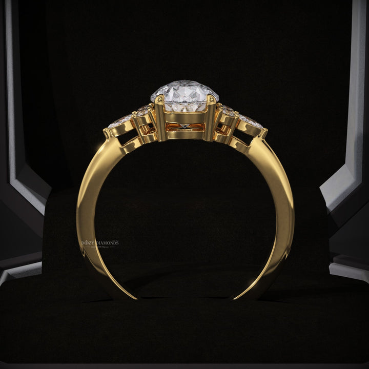 Pear cluster diamond engagement ring available in multiple metals
