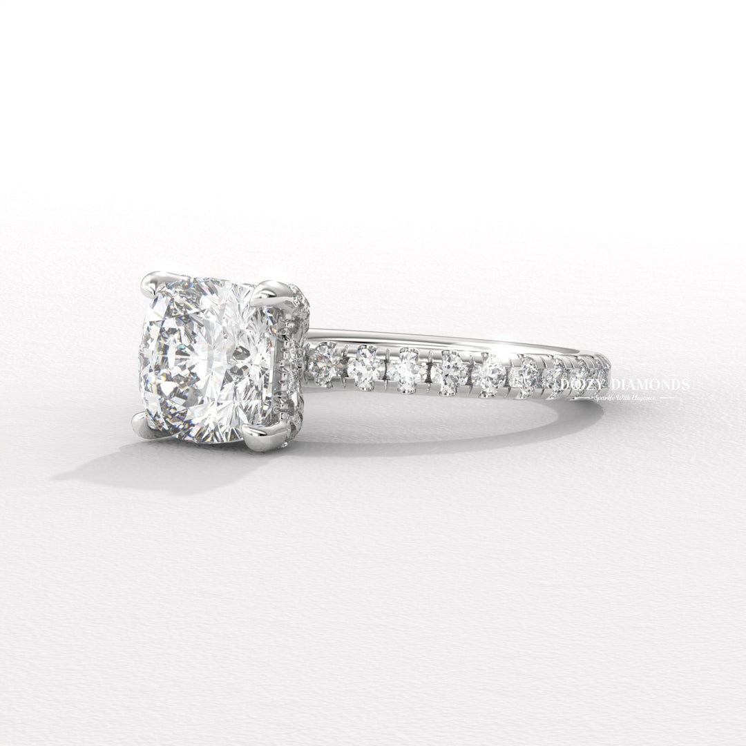 Angled view of cushion cut diamond in solitaire setting