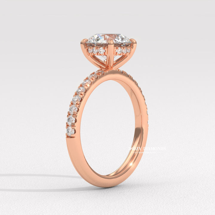 Certified round cut diamond featured in pave engagement ring