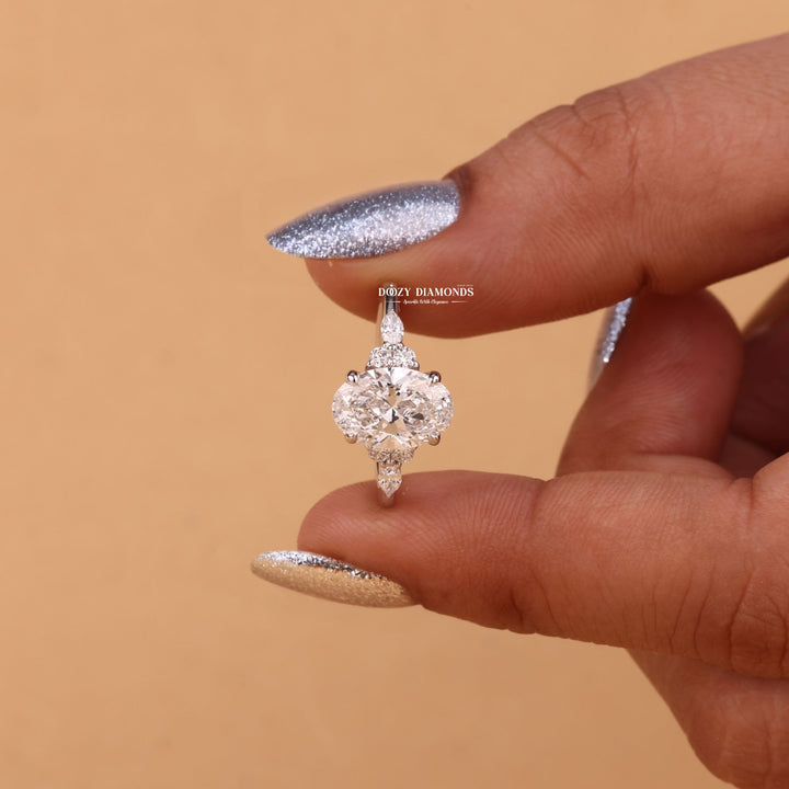 Lifestyle shot of oval cluster diamond ring on hand