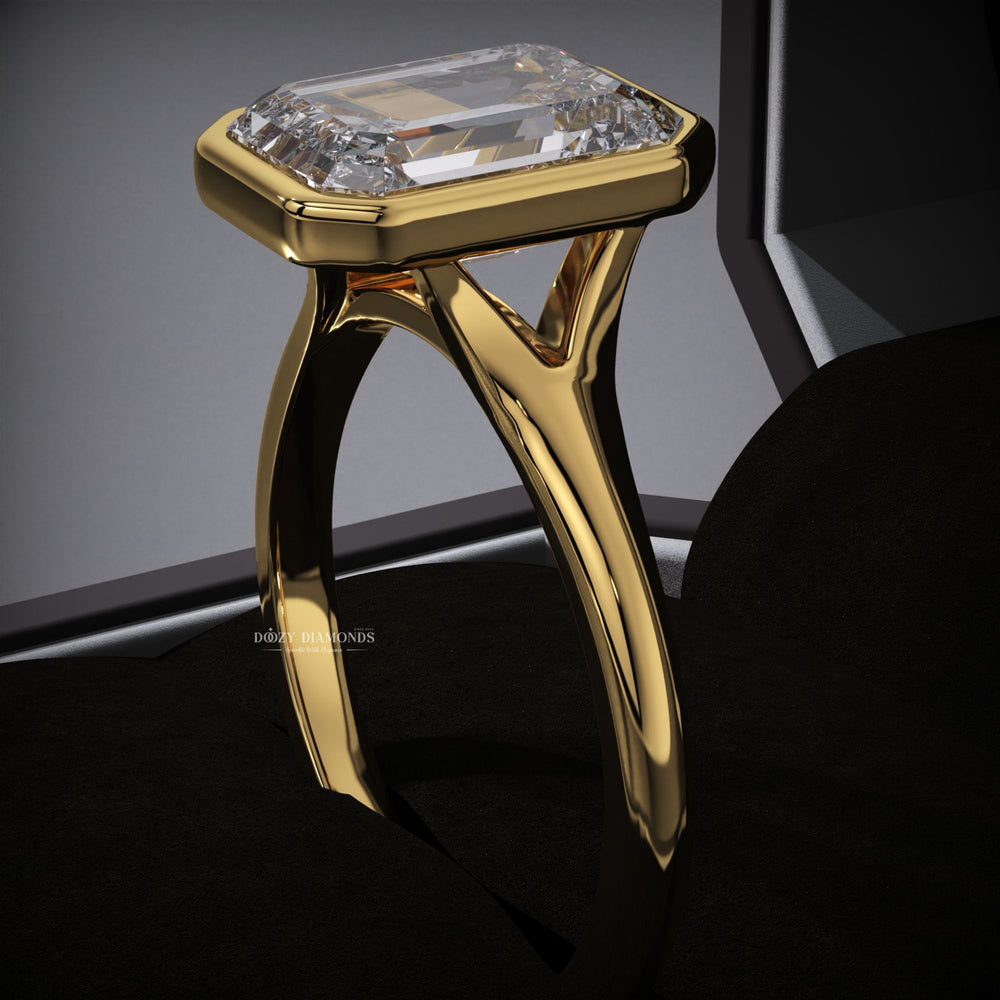 Emerald cut diamond ring worn on hand