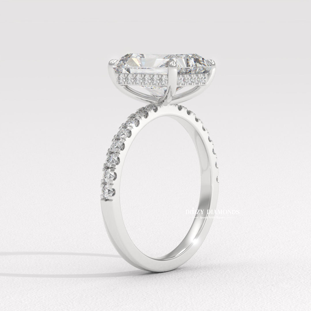 Close-up of radiant cut center diamond in hidden halo engagement ring