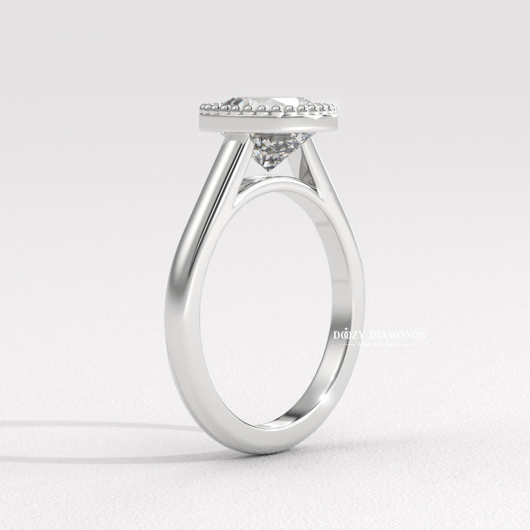Unboxing view of cushion cut bezel diamond engagement ring