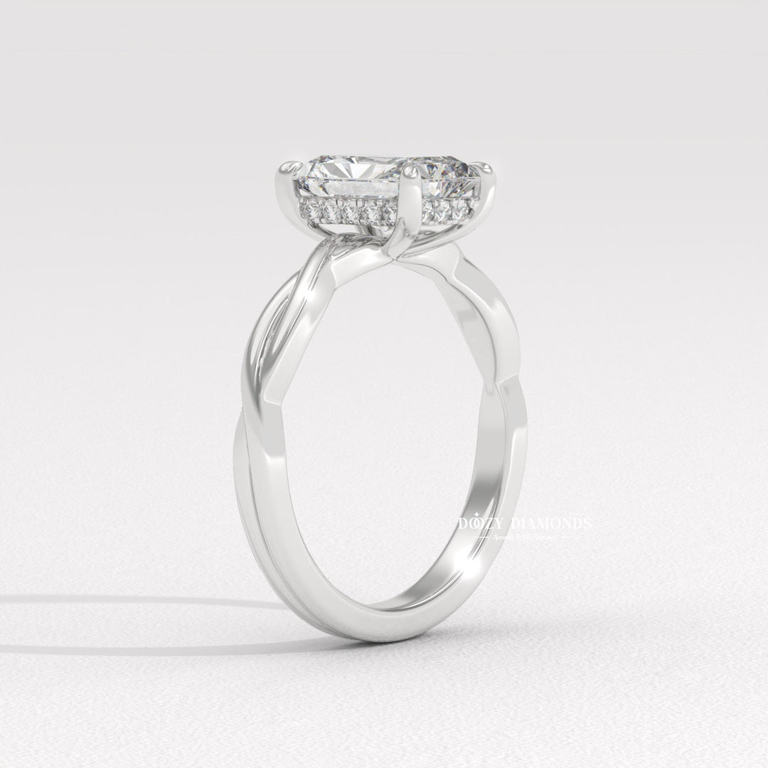Fine craftsmanship detail on radiant solitaire engagement ring