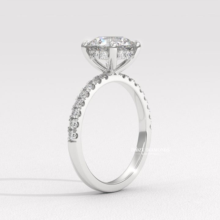 Macro shot of round cut diamond facets in hidden halo ring setting