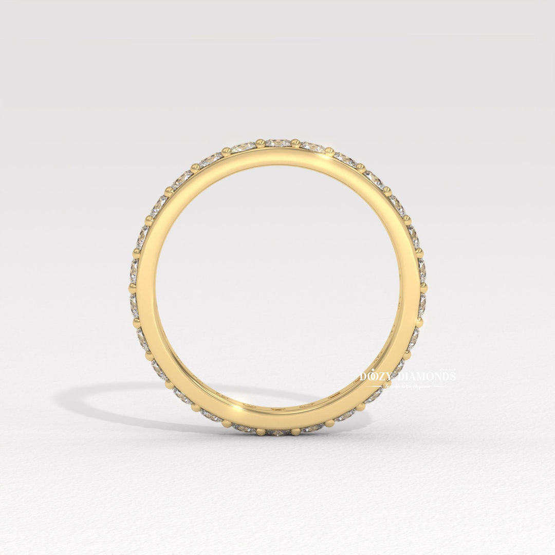 Shared Prong diamond band stacked with engagement ring