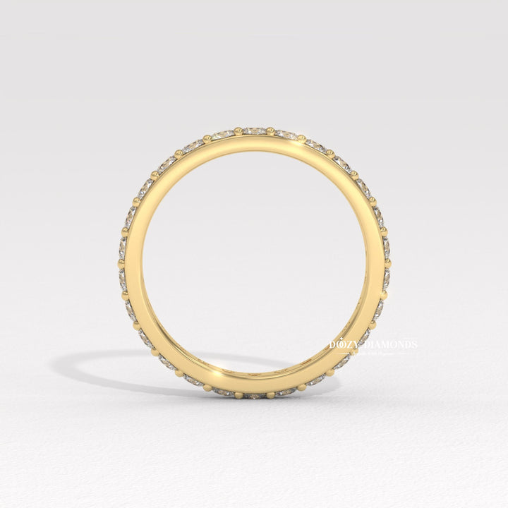 Shared Prong diamond band stacked with engagement ring