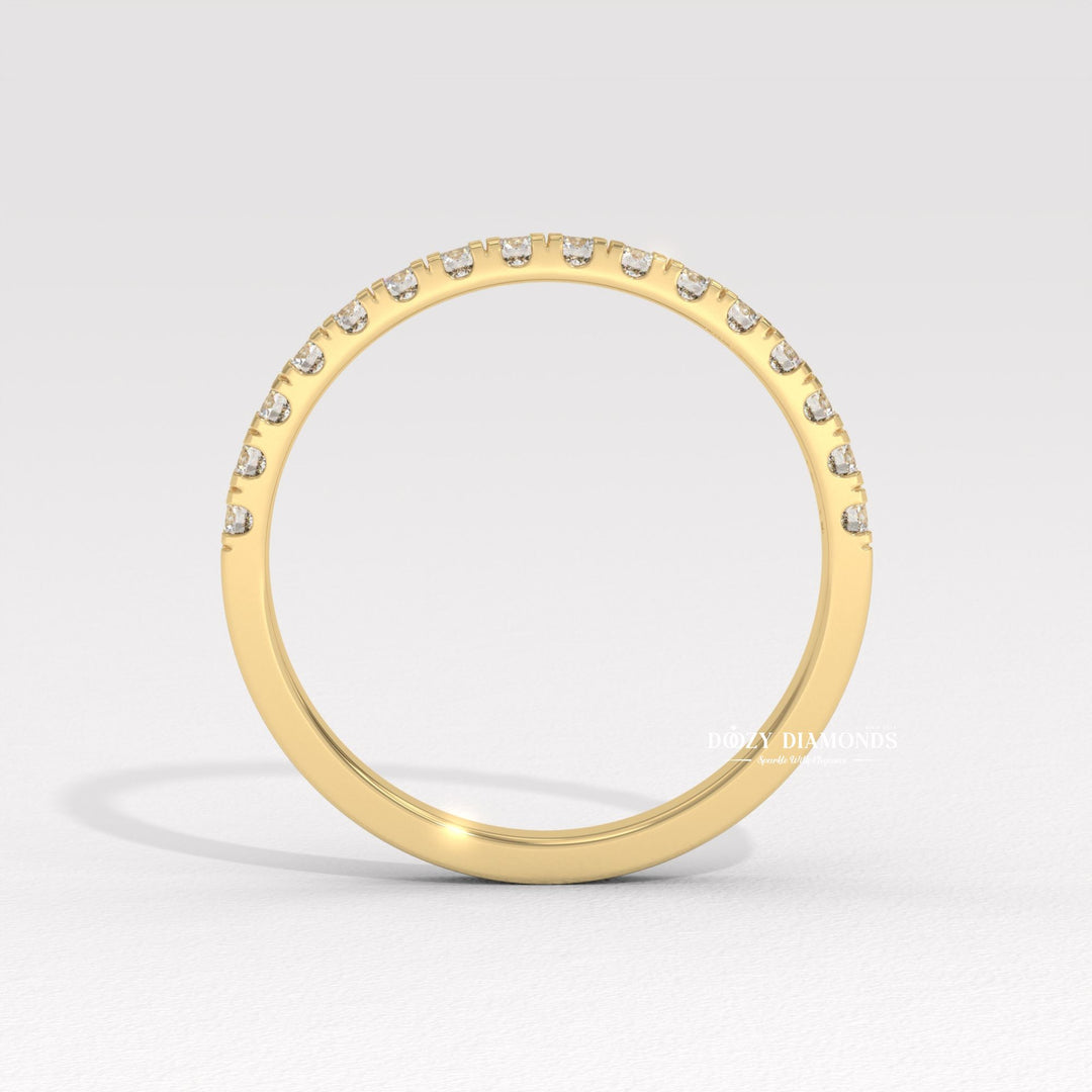 Simple Eternity diamond band stacked with engagement ring