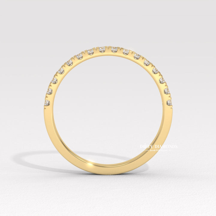 Simple Eternity diamond band stacked with engagement ring