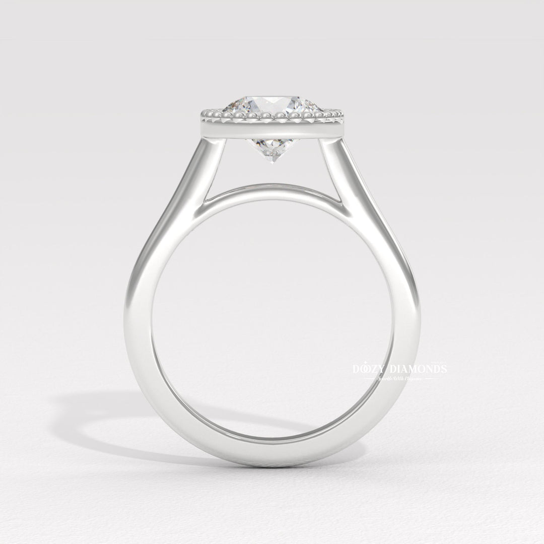 Round bezel engagement ring shown on hand for true-to-life sizing