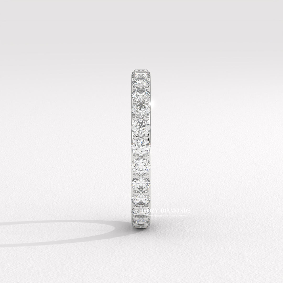 Side view of round diamond wedding band