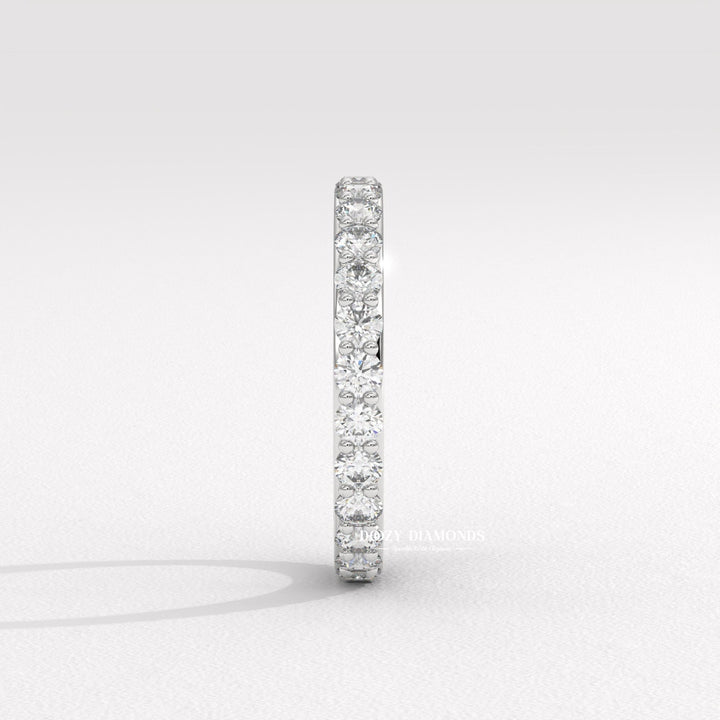 Side view of round diamond wedding band