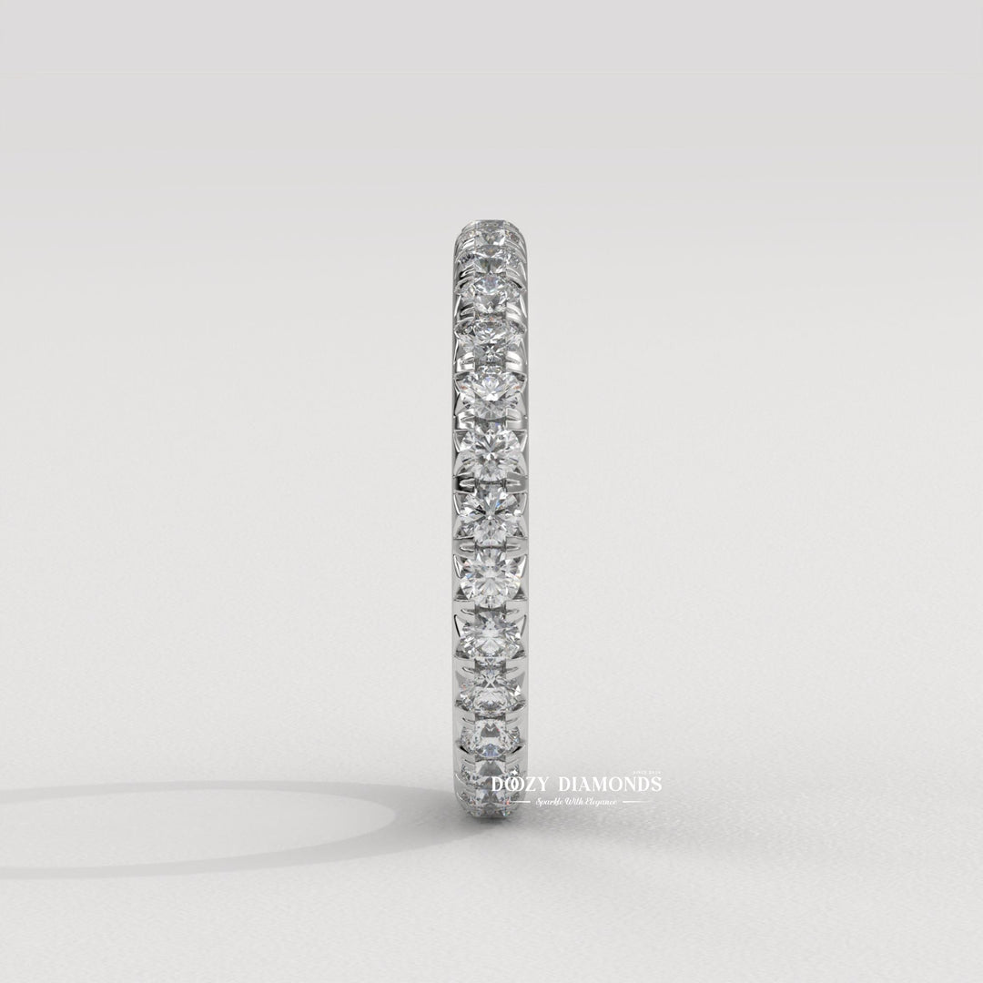 Side view of round diamond wedding band