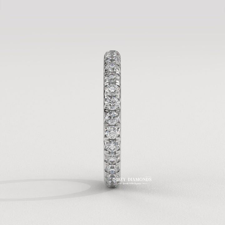 Side view of round diamond wedding band