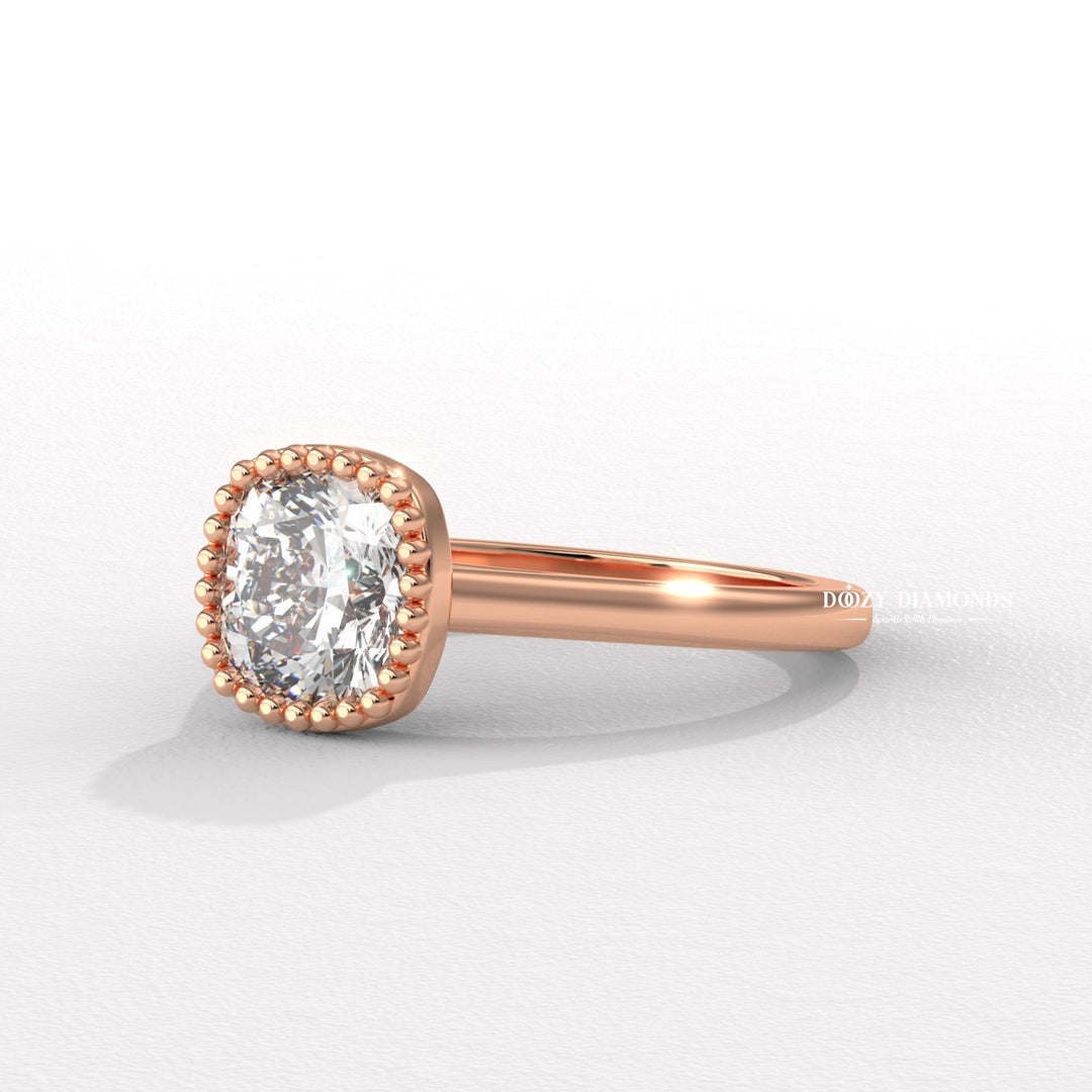 Cushion bezel engagement ring photographed in natural light