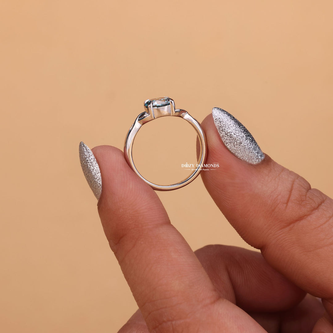 Round cut solitaire engagement ring shown in real-life wear