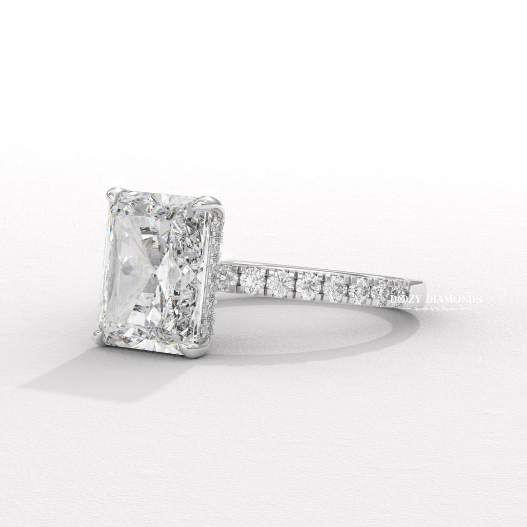 Macro shot of radiant cut diamond facets in hidden halo ring setting