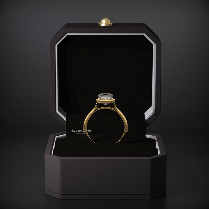 Lifestyle shot of emerald bezel diamond ring on hand