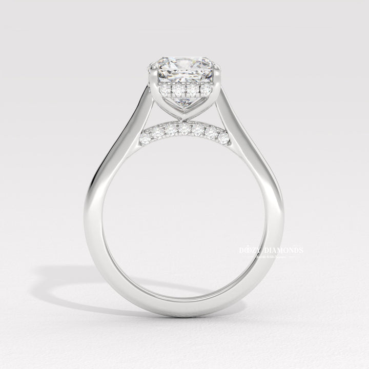 Cushion solitaire ring set with an IGI graded diamond