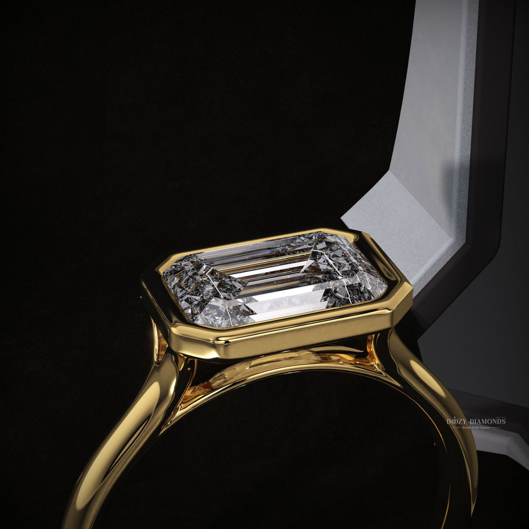 Emerald east west engagement ring close-up showing high clarity diamond clarity