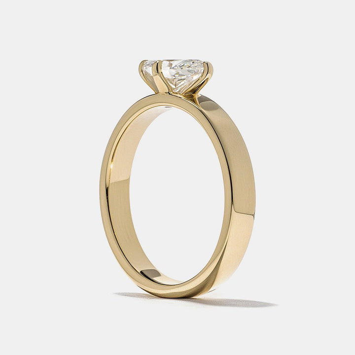 Marquise east west lab grown diamond ring side profile in gold setting