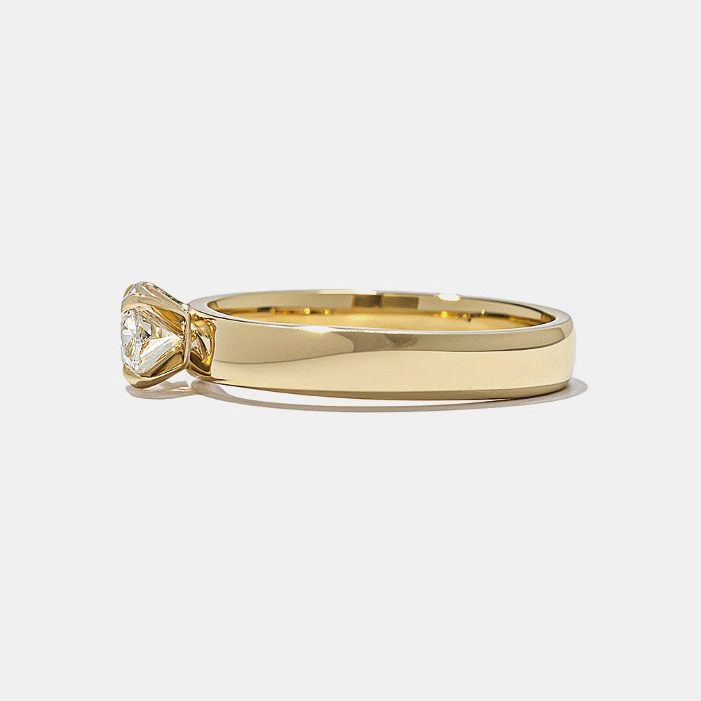 Side angle of oval east west diamond engagement ring