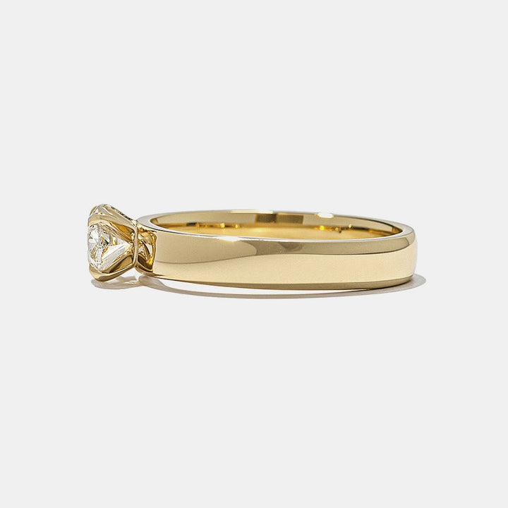 Side angle of oval east west diamond engagement ring