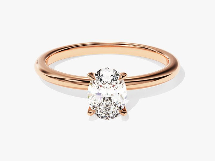 Oval solitaire engagement ring close-up highlighting diamond sparkle