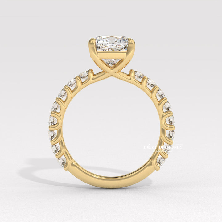 Cushion solitaire engagement ring offered in gold and platinum