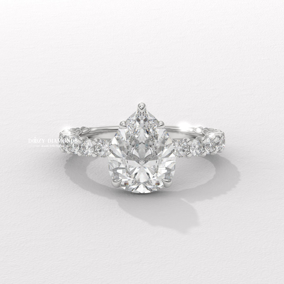 Angled view of pear cut diamond in solitaire setting